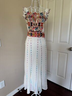Gorgeous ivory dress with embroidery inspired by Mayan designs. Maeve